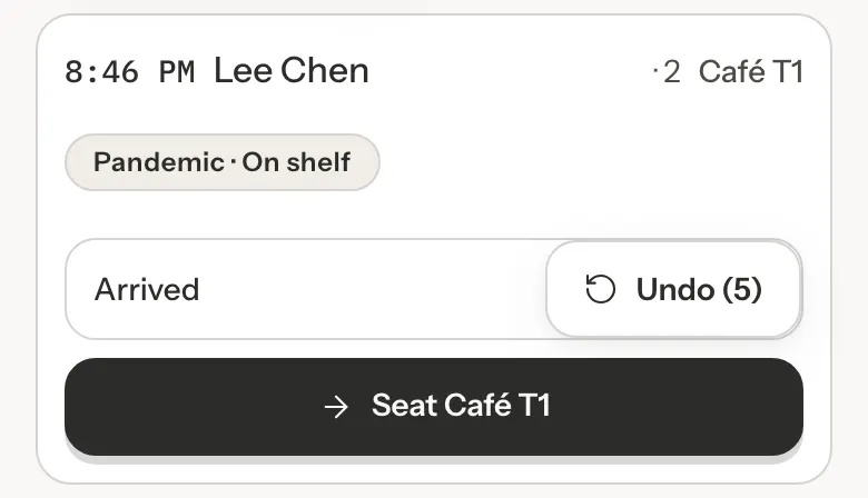 A row just marked Arrived, showing an Undo (5) button and a Seat Café T1 button below.