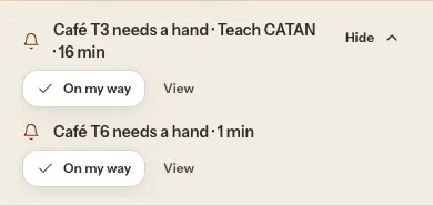 On a phone, a banner listing two tables, Café T3 and Café T6, each with On my way and View buttons, and a Hide button.