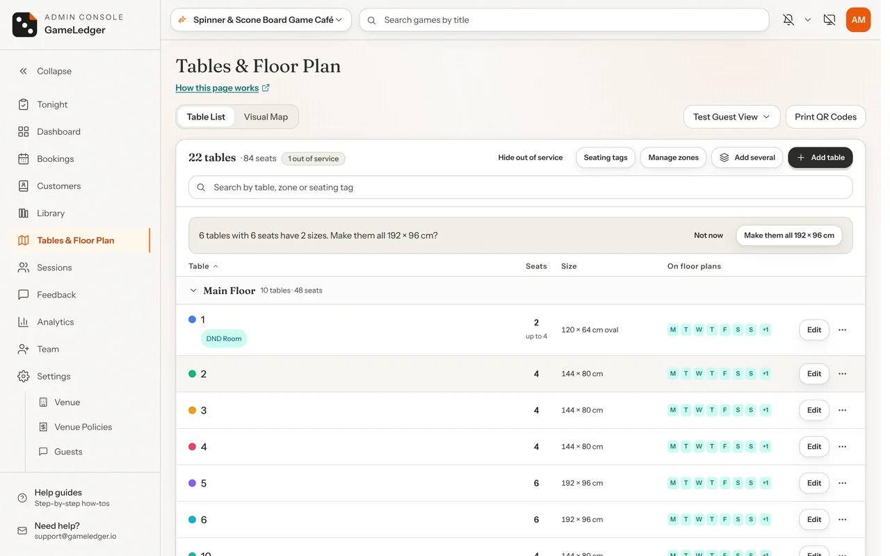 The Tables & Floor Plan page with the Table List open, and the Test Guest View and Print QR Codes buttons at the top right.
