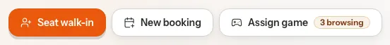 The three header buttons: Seat walk-in, New booking and Assign game with a count of tables browsing.