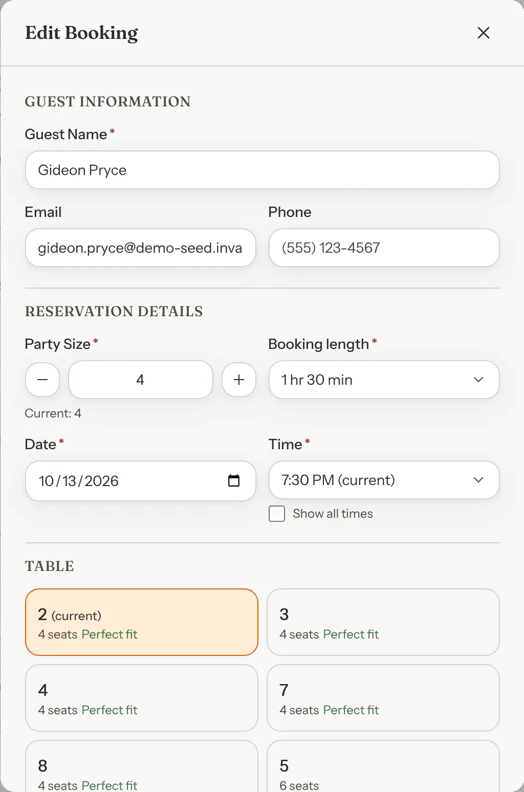 The Edit Booking window showing the party size, booking length, date and time, and the free tables with the booking's table marked current.