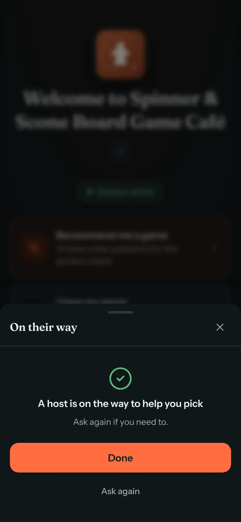 The guest's screen headed On their way, with a green tick, the line A host is on the way to help you pick, and Done and Ask again buttons.