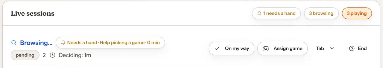 A live session on the Sessions page with the label Needs a hand, Help picking a game, 0 min, and the buttons On my way, Assign game, Tab and End.