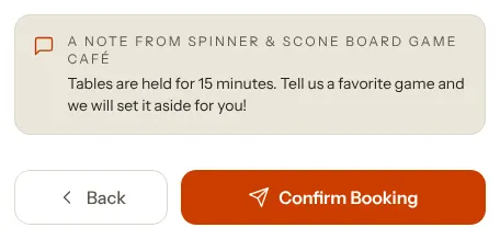 The last booking step, showing a panel headed A note from Spinner & Scone Board Game Café with the message about tables being held for 15 minutes, above the Back and Confirm Booking buttons.