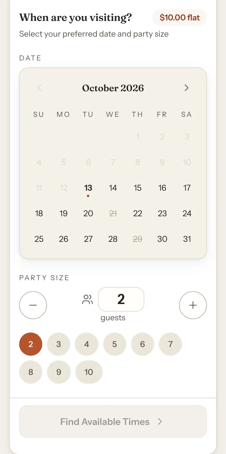 A phone showing the When are you visiting? calendar for October, with two upcoming dates, the 21st and the 29th, struck through as closed.