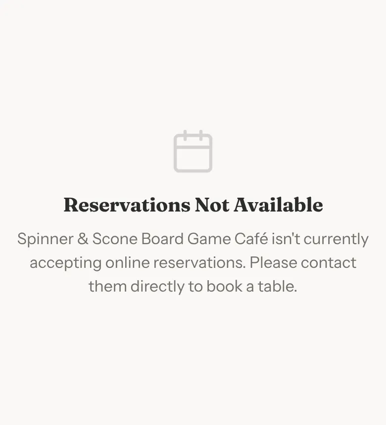 A phone showing the booking page with the heading Reservations Not Available and a line saying the café isn't currently accepting online reservations.